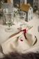 Preview: Stoffserviette Tradition *Weihnachtskugel-Tannenzweig* leinenfarbig